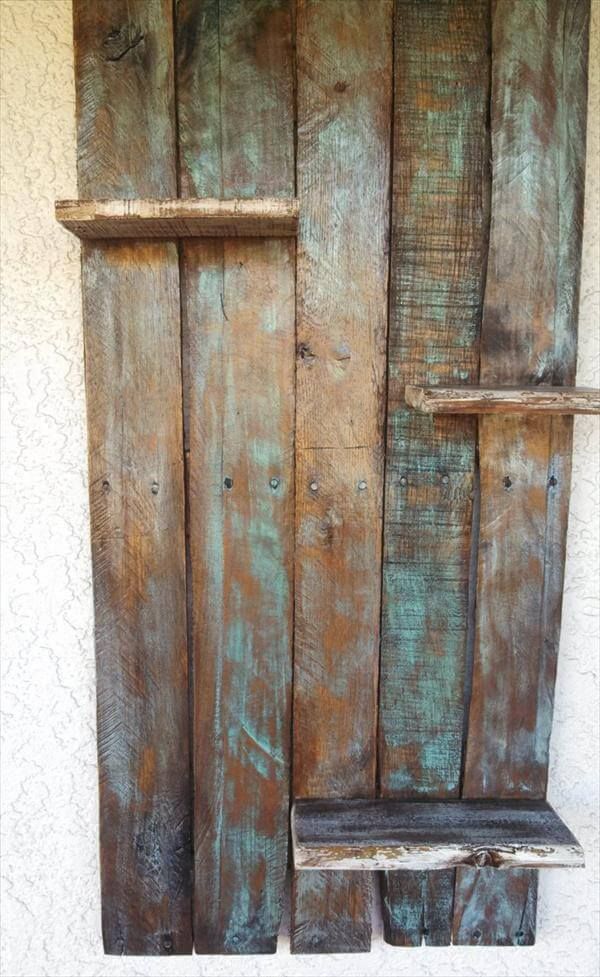  this pallet shelf from etsy shop and shop name is upCycledreCreations