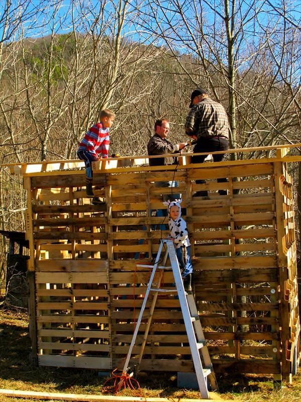 making the tin roof of pallet barn