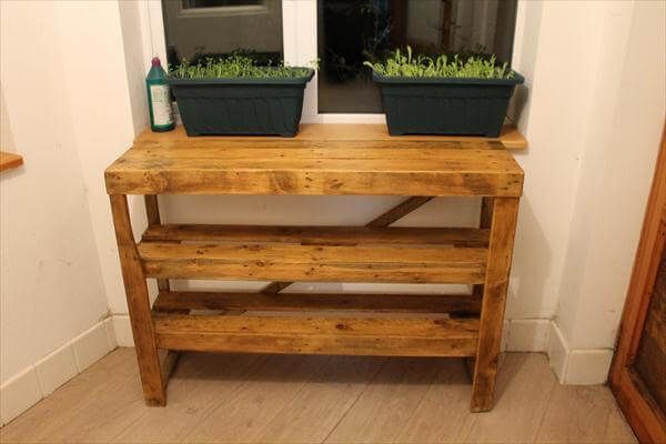 repurposed pallet potting table with shelves