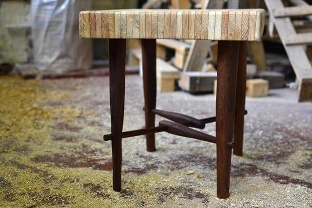 upcycled pallet table with reclaimed wooden legs