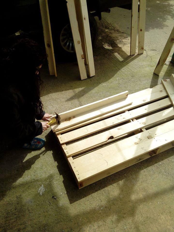 making the angular wooden legs of coffee table