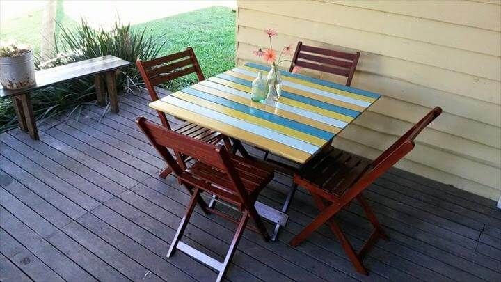 recycled pallet dining table and 4 folding straight chairs