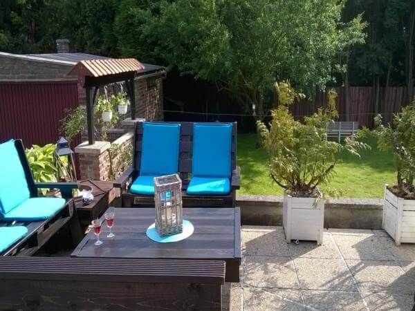 upcycled pallet black stained chairs and benches