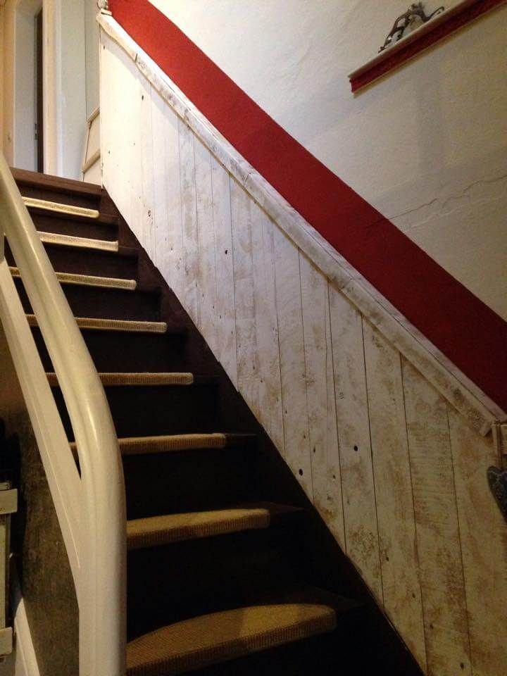 reclaimed pallet accent stair wall paneling