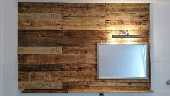 recycled pallet bathroom wall with mirror
