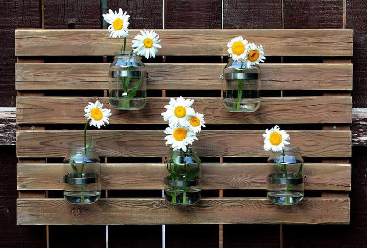 recycled pallet and Mason jars wall organizer