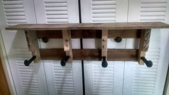 brown stained pallet coat rack