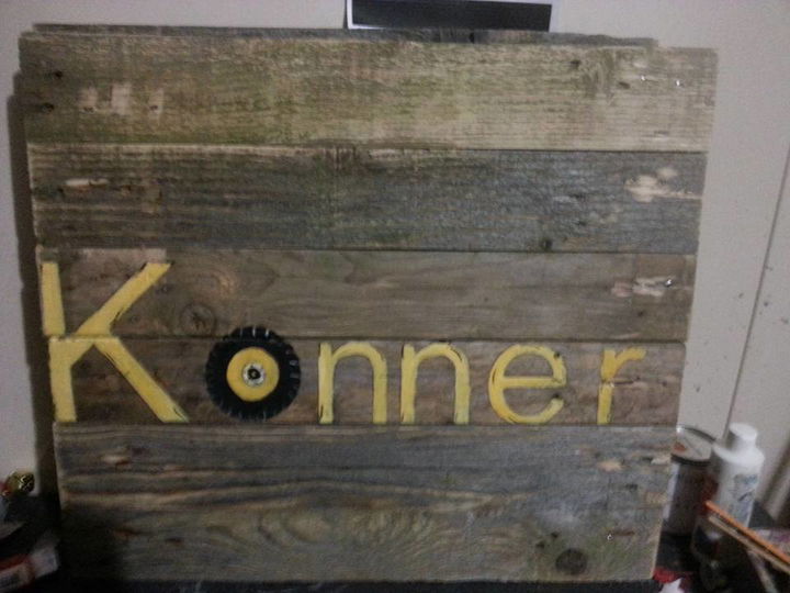 handmade pallet art with stenciled name