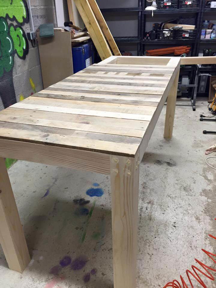 Repurposed pallet multi functional table