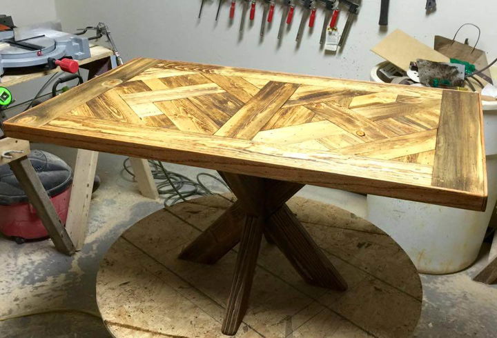 Repurposed pallet dining table with X base