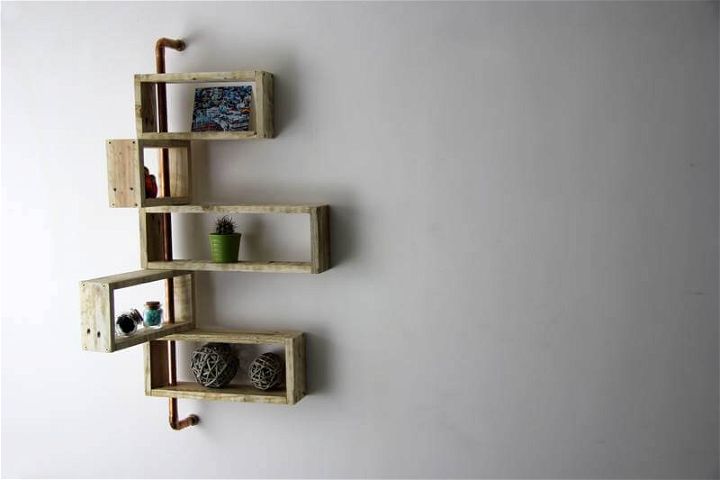 handcrafted wooden pallet and metal pipe display shelves
