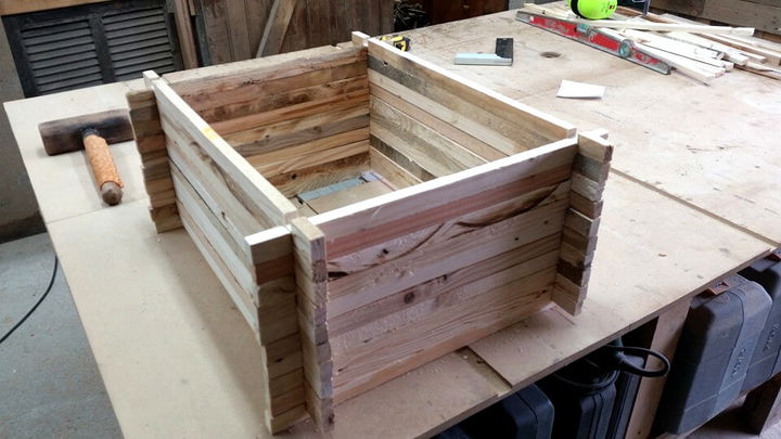 framing up the pallet slats to build up the base
