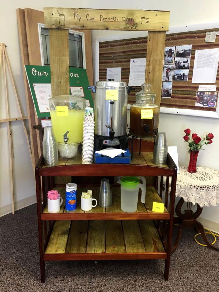 refurbished old bench into pallet drink stand