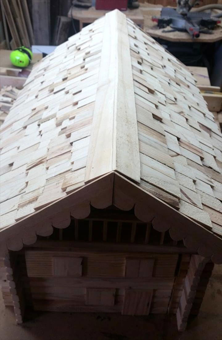 wooden pallet mailbox with shingled roof