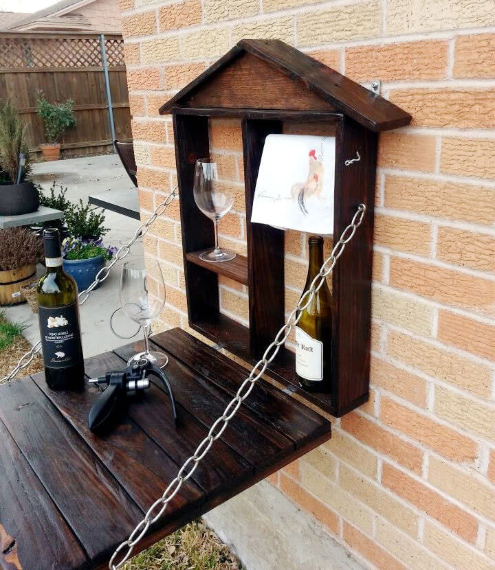 folding down patio wall built with pallets