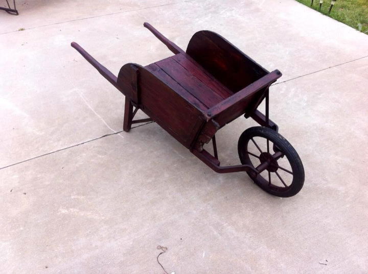 Wooden pallet wheelbarrow planter