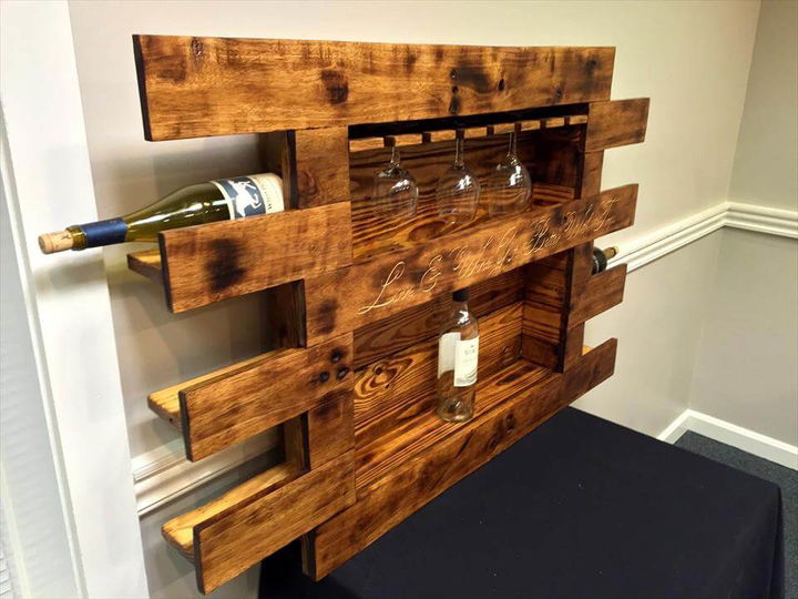 repurposed wooden pallet beverage bottle and glass rack
